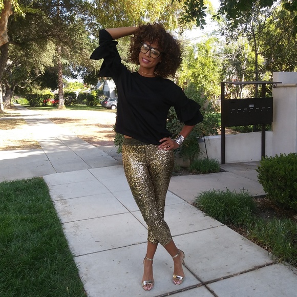 Ktoo Sweaters - Black long sleeved sweater blouse with flare